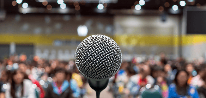 microphone-abstract-blurred-photo-conference-hall-seminar-room-exhibition-center-b